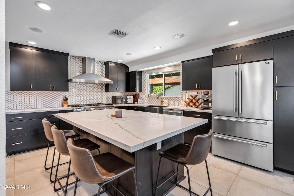 7702 De Soto Avenue